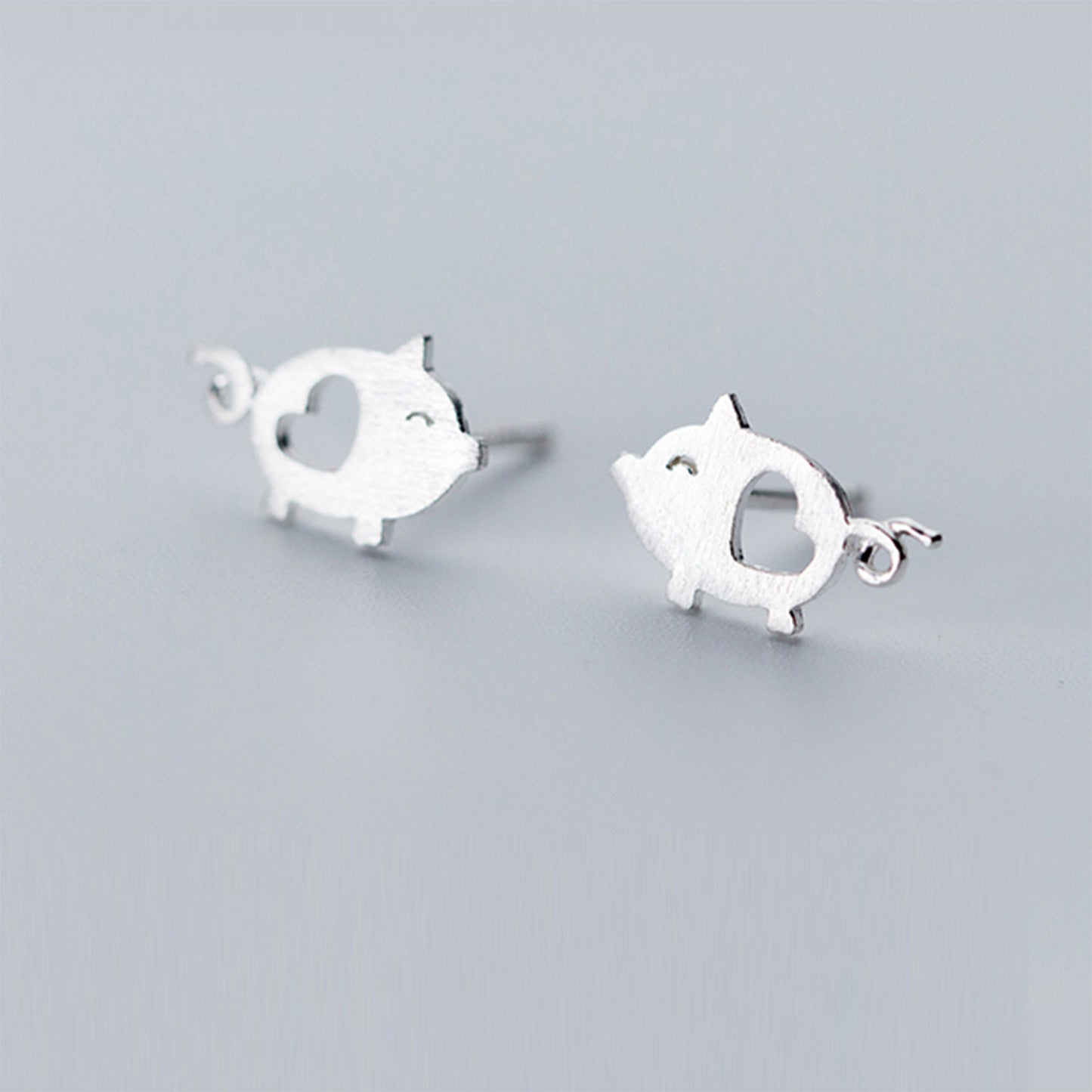 Sterling Silver Pig with Cut-Out Heart Stud Earrings