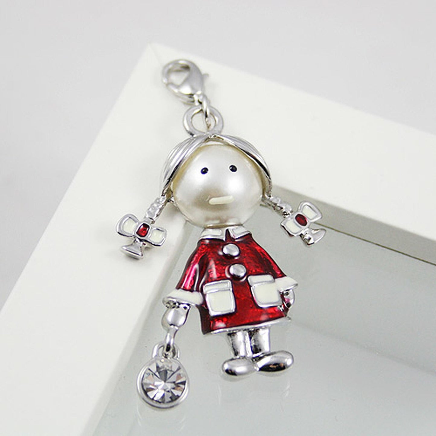 Little Girl in a Red and White Coat with Pigtails Clip-On Bracelet Charm