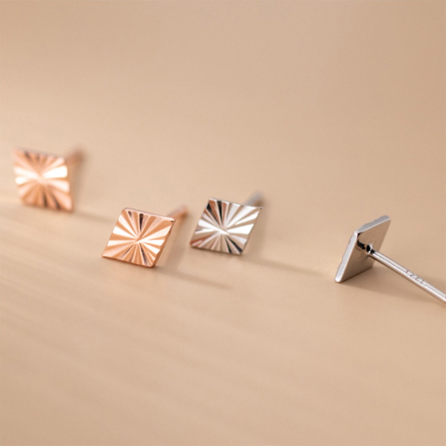 Rose gold plated sterling silver geometric sunray  ray of sunlight studs earrings