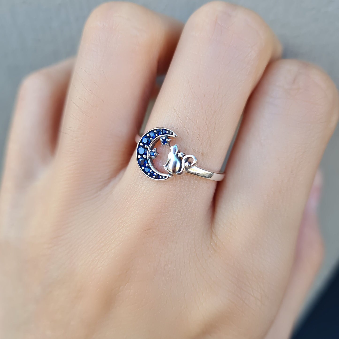 Sterling silver cat looking at the crescent moon in blue night starry sky ring band adjustable Cat Blue Moon Silver Stud Earrings